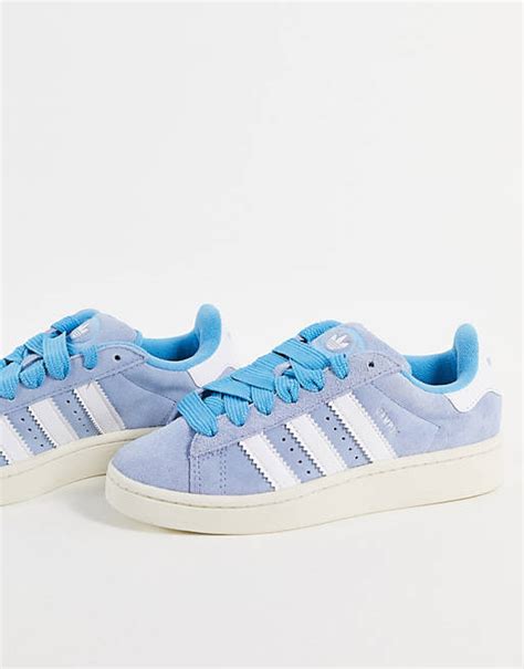 light blue adidas campus 00s.